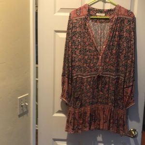 Spell & Gypsy The Jasmine dress is a beautiful, long sleeves mini.